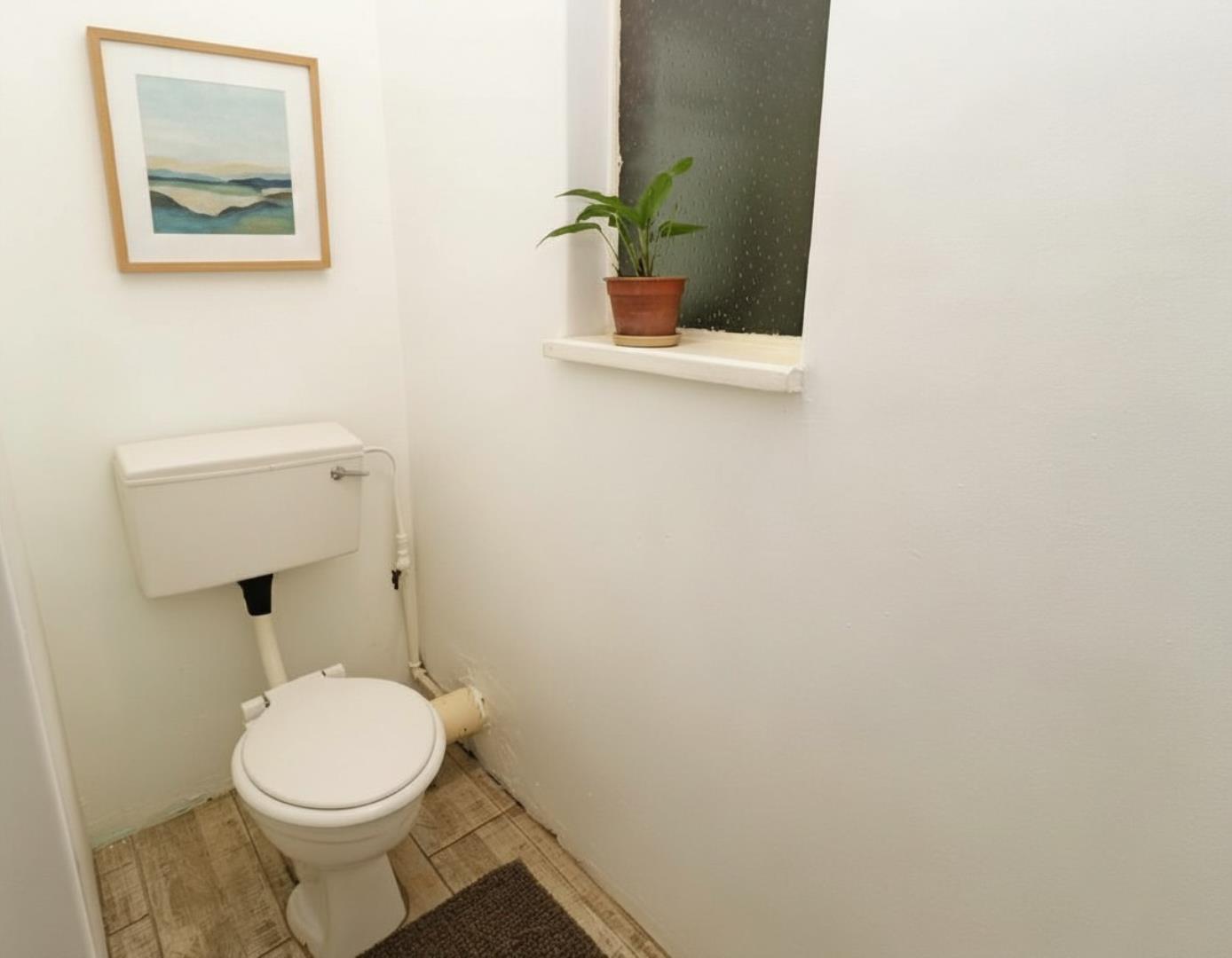 706459_edited-add-wall-picture-above-the-toilet.jpeg